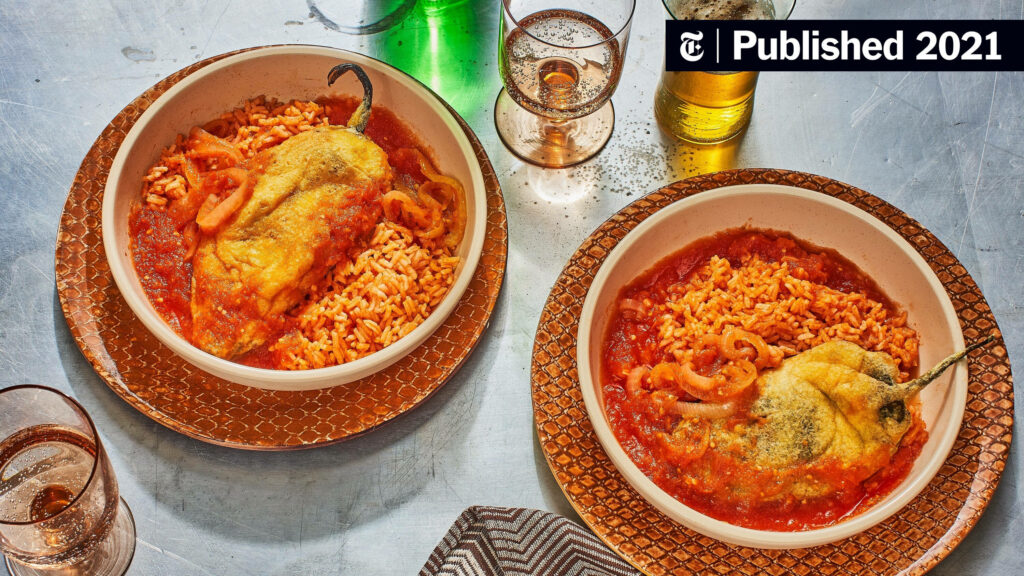 Vibrant Wallpaper of Mexican Cuisine: Chili Rellenos & Rice Delight