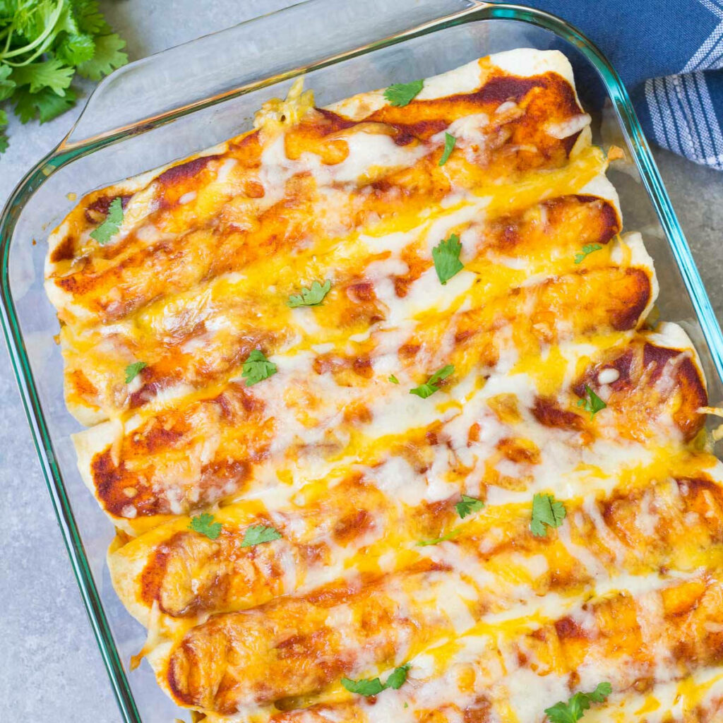 Vibrant Mexican Enchiladas Wallpaper with Cheese & Cilantro Decor
