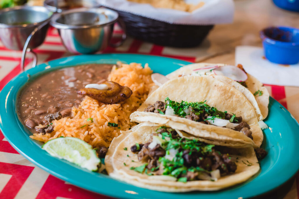 Vibrant Mexican Food Wallpaper: Tacos, Rice, Beans & Lime Delight