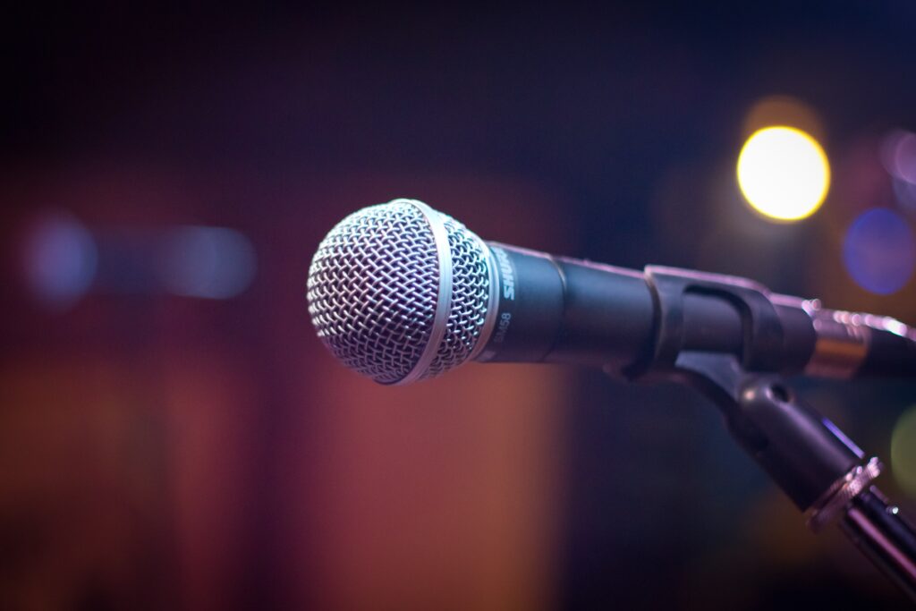 Vibrant Microphone Close-Up: Energizing Music Wallpaper Background