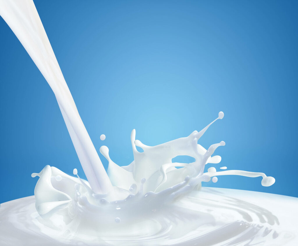 Vibrant Milk Splash Wallpaper: Dynamic Food Photography Art
