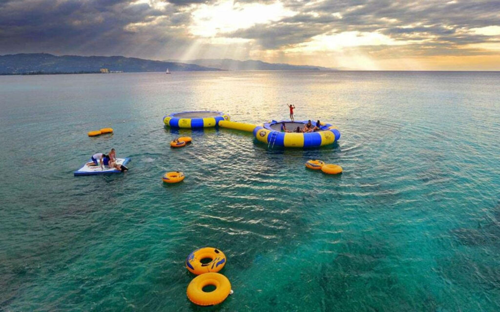Vibrant Mini Inflatable Water Park in Stunning Montego Bay Wallpaper