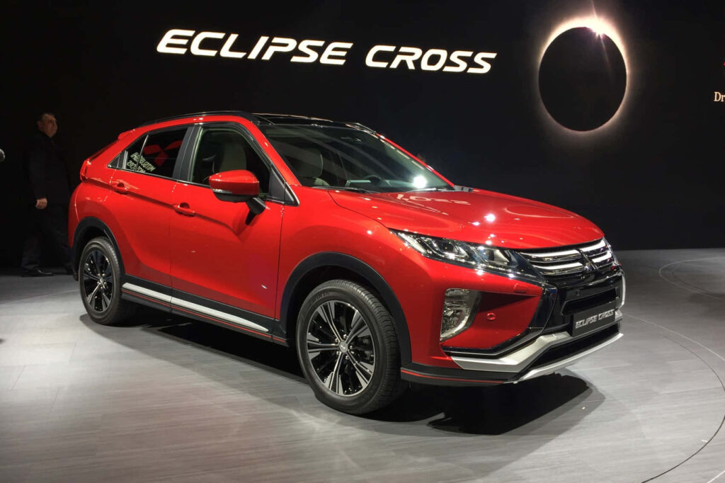 Vibrant Mitsubishi Eclipse Cross Wallpaper: Sleek Design & Bold Red