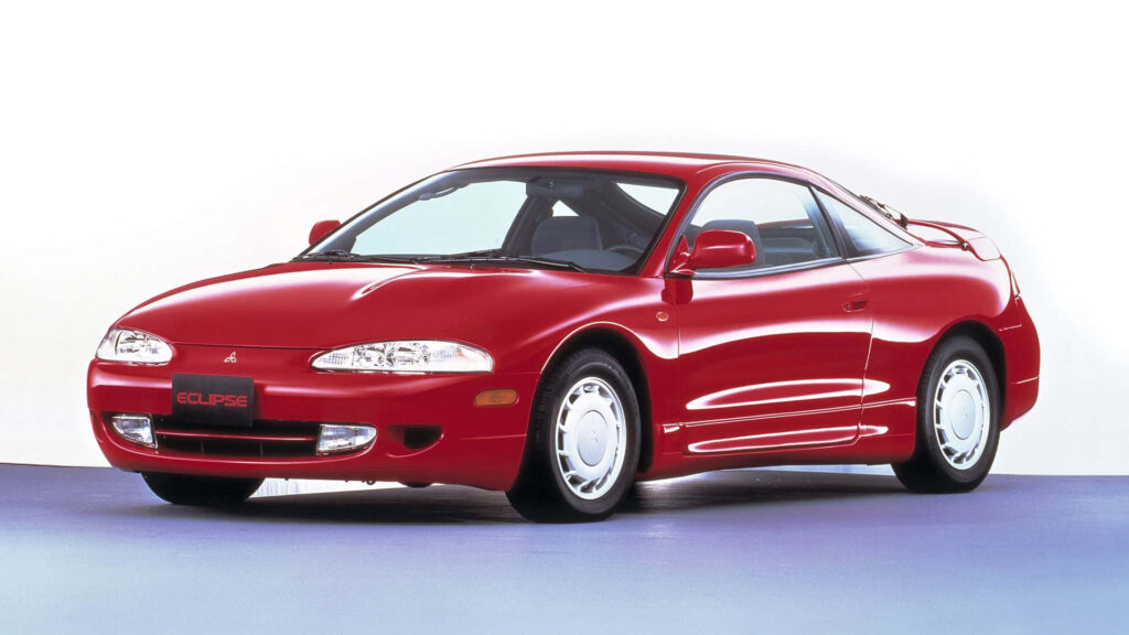 Vibrant Mitsubishi Eclipse Wallpaper: Sleek, Red & Sporty Design