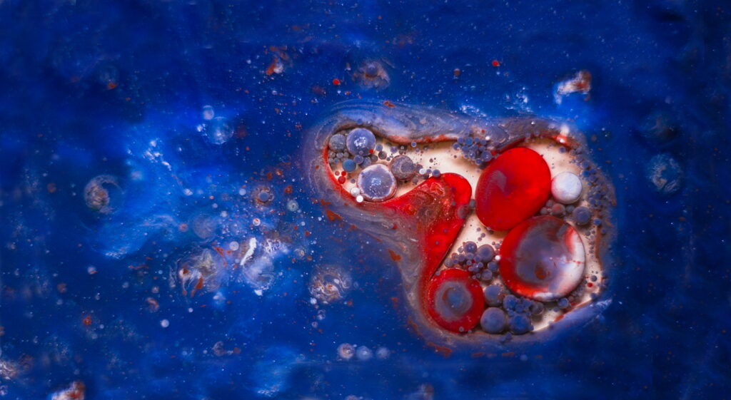Chromatic Harmony: Mesmerizing Blue and Red QHD Abstract Art Wallpaper