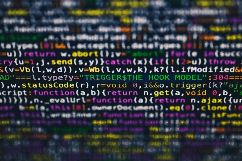 Vibrant Coding Wallpaper: Colorful Code Display on Dark Background