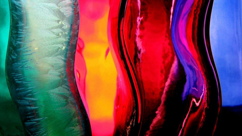Vibrant Multi-Colored Glass Wallpaper: Dynamic Liquid Textures