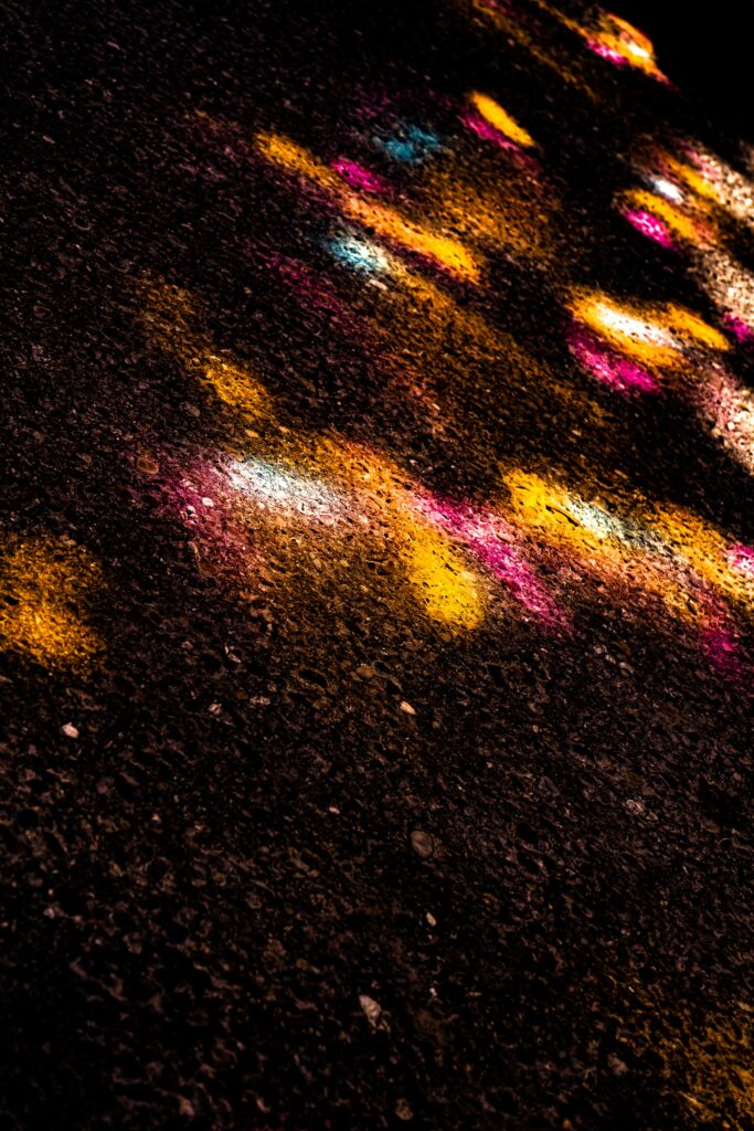 Vibrant Multi-Colored Light Patterns Wallpaper - Dark Textured Background