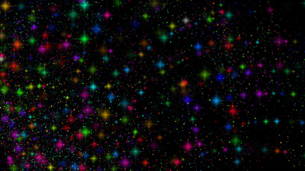 Vibrant Multi-Colored Star Wallpaper on Dark Cosmic Background