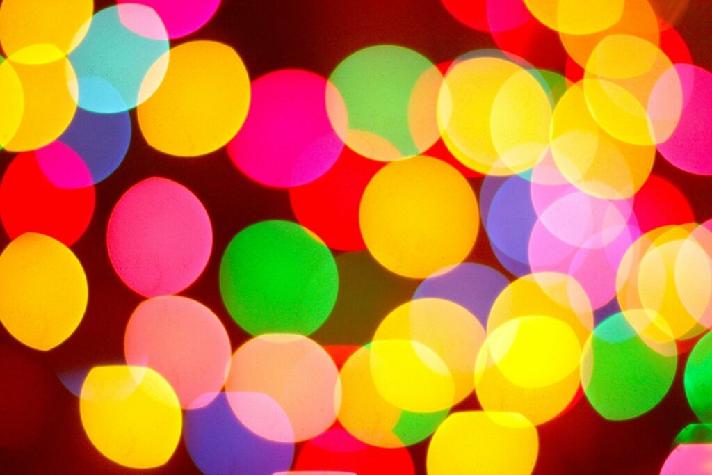 Vibrant Multicolored Bokeh Wallpaper | Festive Dark Background