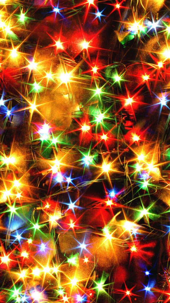 Festive Multicolored Christmas Lights Wallpaper for a Joyful Background