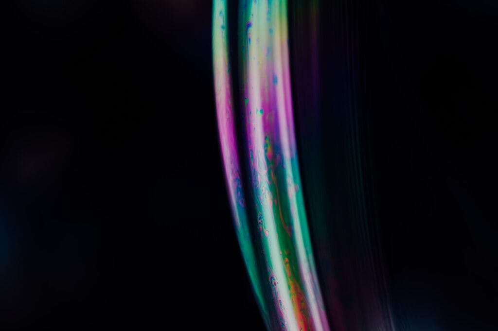Vibrant Multicolored Gradient Wallpaper with Abstract Patterns