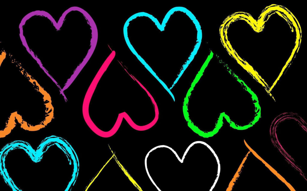 Vibrant Multicolored Heart Wallpaper on Black Background - Joyful Design