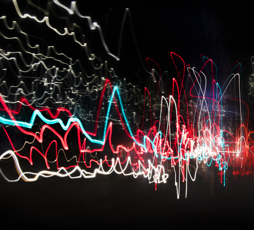 Vibrant Multicolored Neon Lines Glowing Abstract Background Wallpaper