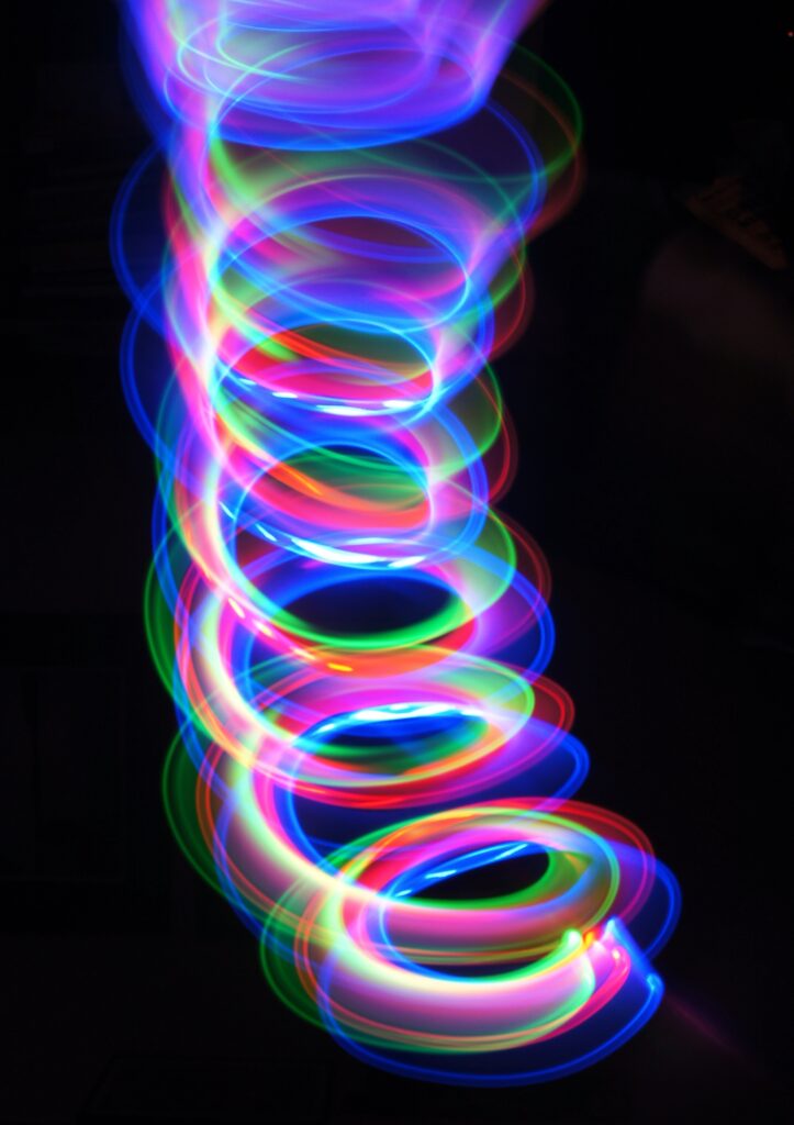 Vibrant Spiral Wallpaper: Multicolored Wavy Lines Background