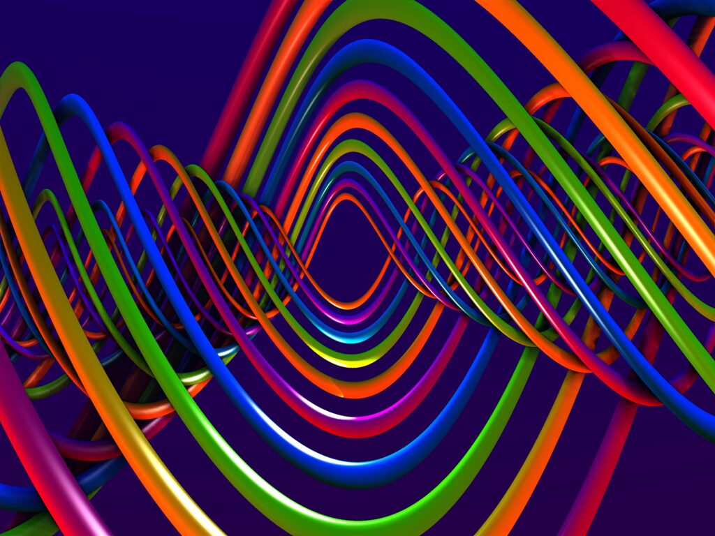 Vibrant Multicolored Spiral Wallpaper on Deep Purple Background