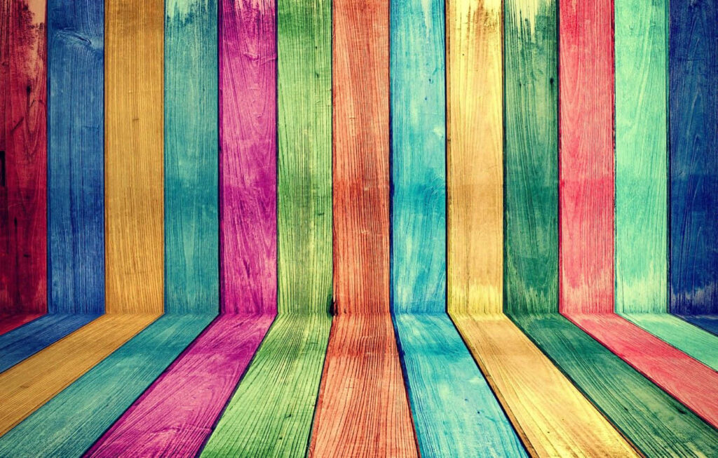 Vibrant Multicolored Vertical Wood Plank Wallpaper Background