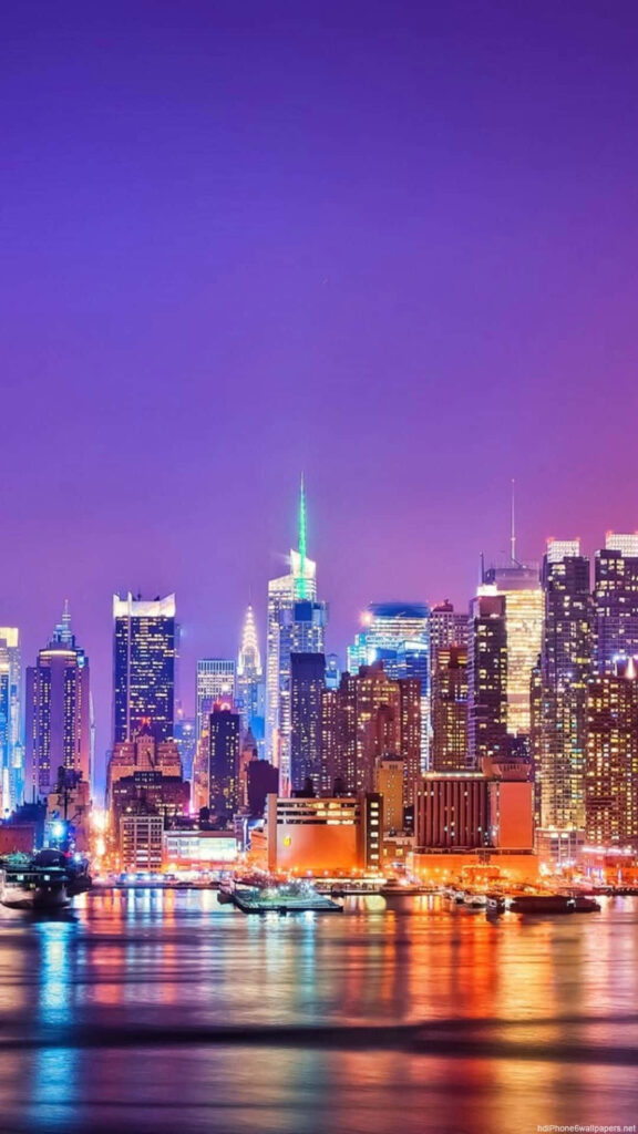Vibrant NYC Night Skyline iPhone Wallpaper - Stunning Water Reflections