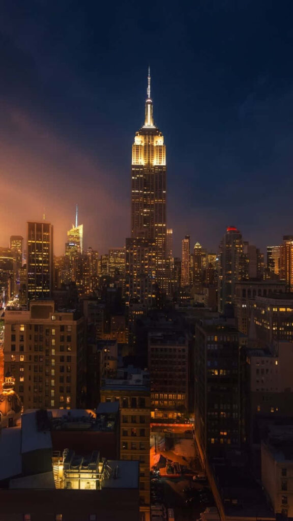 Vibrant NYC Skyline at Night: Stunning iPhone Wallpaper Background