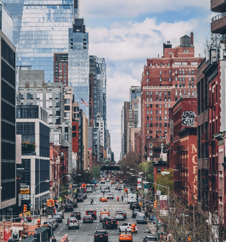Vibrant NYC Streets: Skyscrapers, Architecture & Lively Traffic Wallpaper