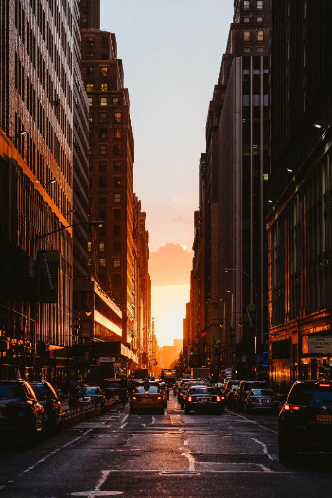 Vibrant NYC Sunset Wallpaper: Illuminated Streets & Urban Landscape
