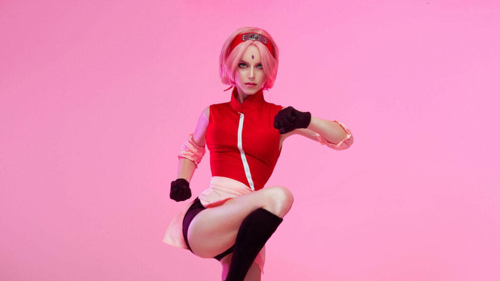Vibrant Naruto Cosplay Wallpaper: Sakura Haruno in Dynamic Pose