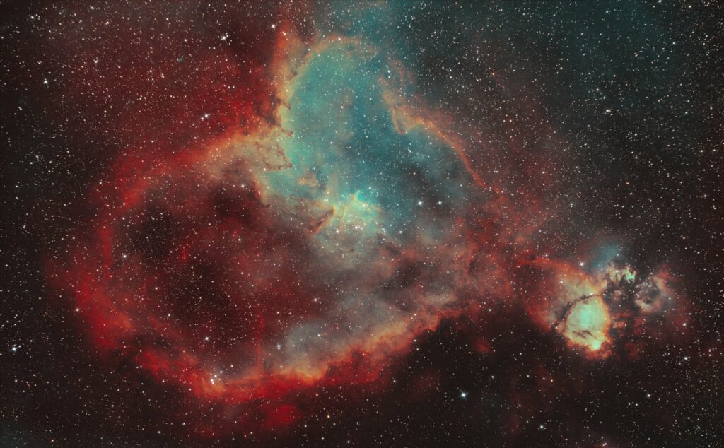 Vibrant Nebula Wallpaper: Cosmic Stars & Hues of Red, Blue, Orange
