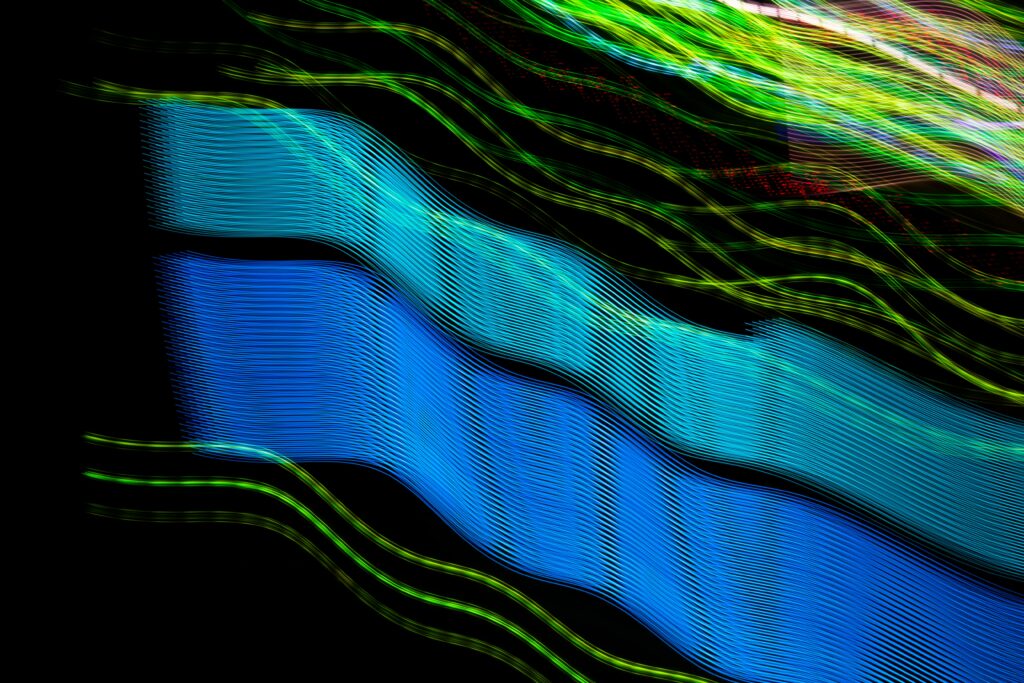 Vibrant Neon Abstract Wallpaper with Glowing Wavy Lines