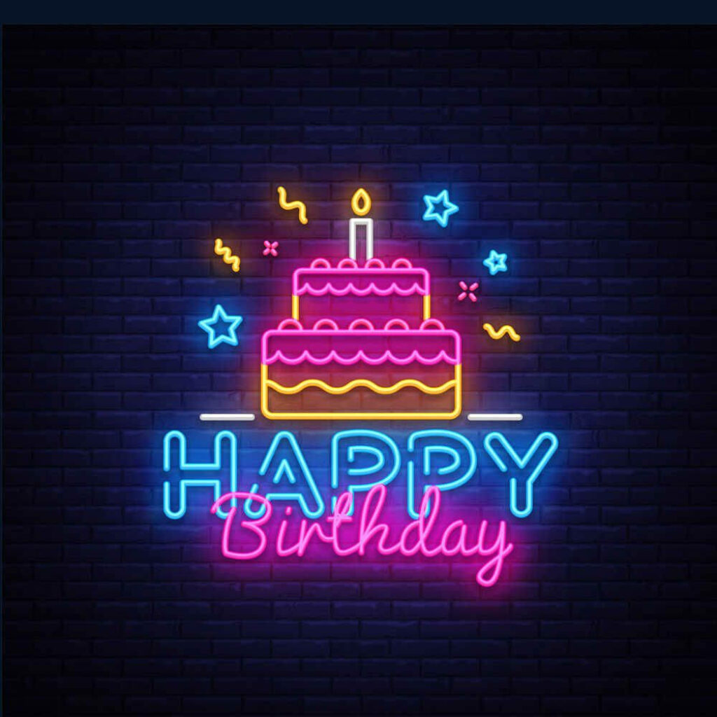 Neon Happy Birthday Wallpaper with Cake & Confetti Against Dark Brick