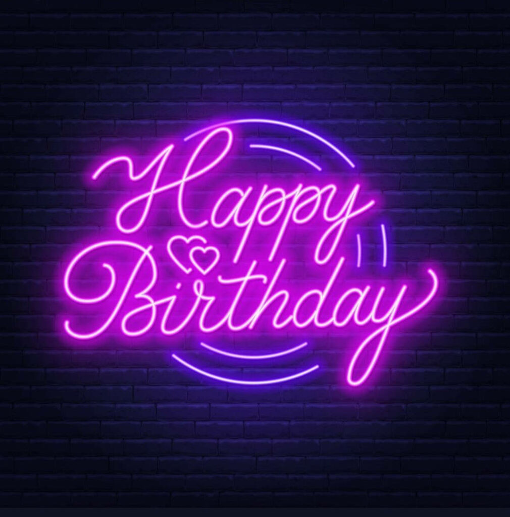 Vibrant Neon Happy Birthday Wallpaper on Dark Textured Background