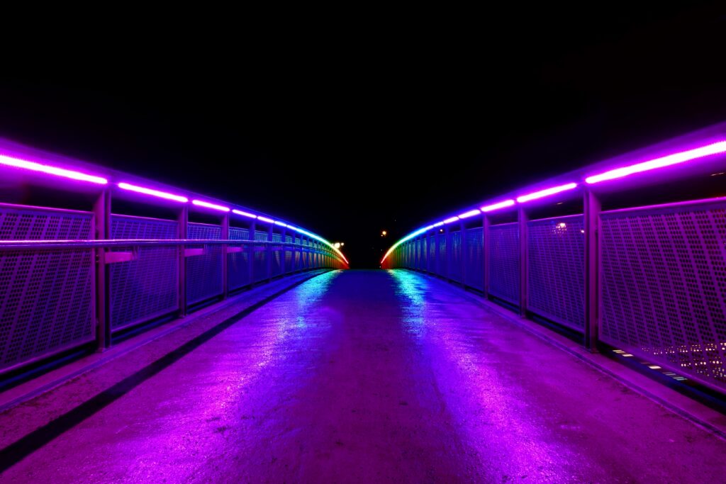 Neon Bridge Wallpaper: Captivating Nighttime Scene in Vibrant Hues