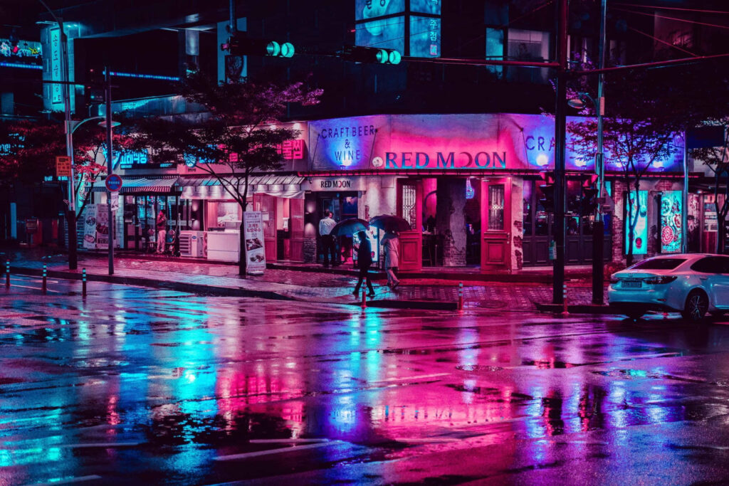 Neon Cityscape at Night: Vibrant Rainy Reflections - Wallpaper
