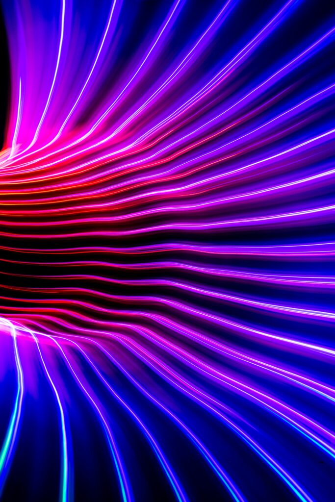 Vibrant Abstract Neon Light Wallpaper with Dynamic Energy