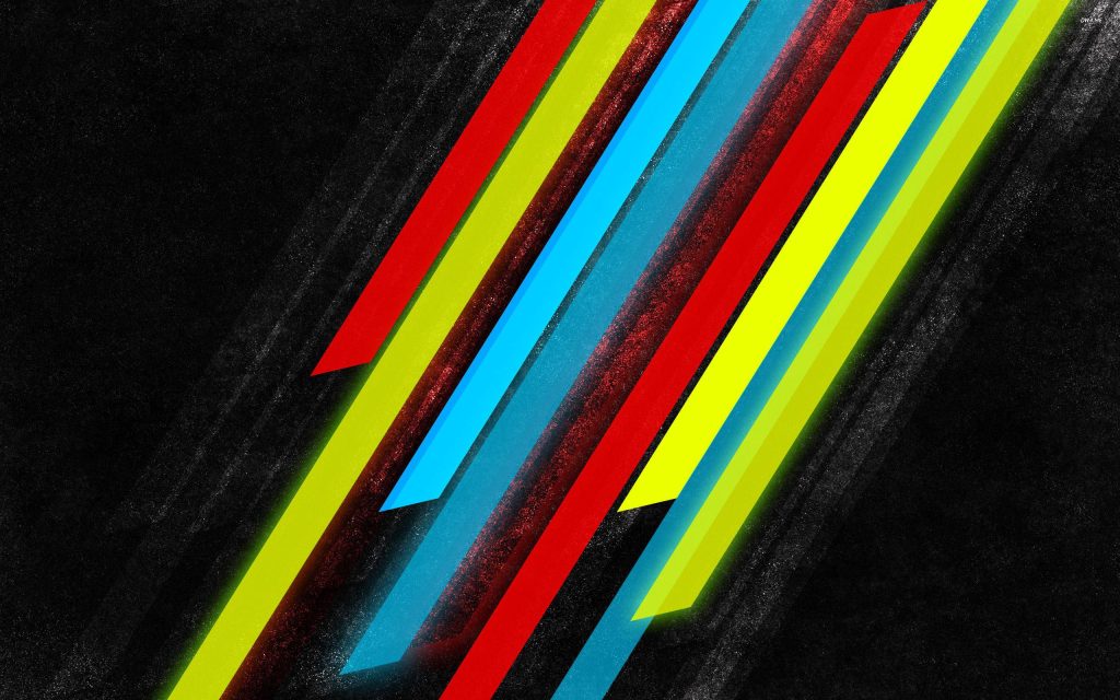 Abstract wallpaper with vibrant neon red yellow blue diagonal stripes on black textured background