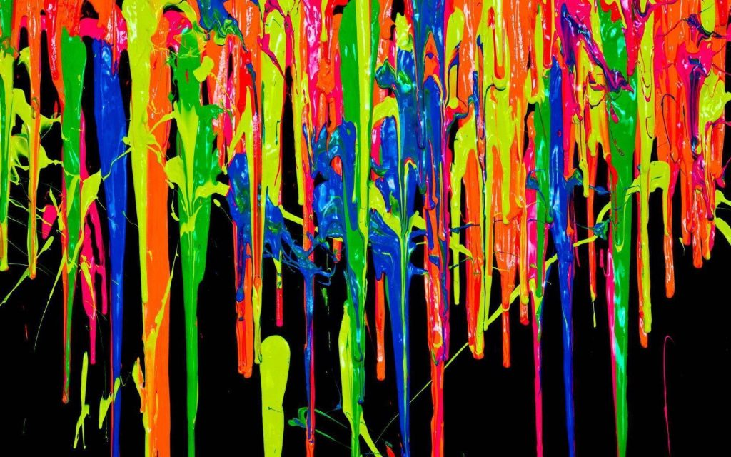 Black wallpaper with vibrant neon green orange pink and blue dripping paint streams background