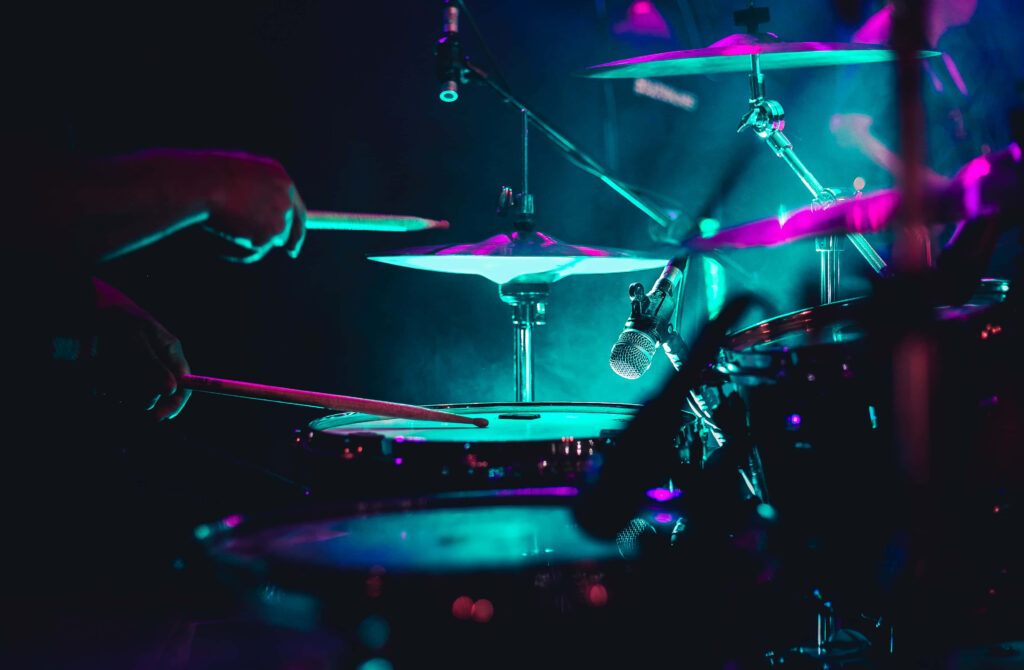 Vibrant Neon Drum Session Wallpaper Background: Energy & Motion