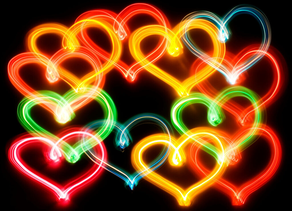Vibrant Neon Heart Wallpaper: Colorful Lights on Dark Background