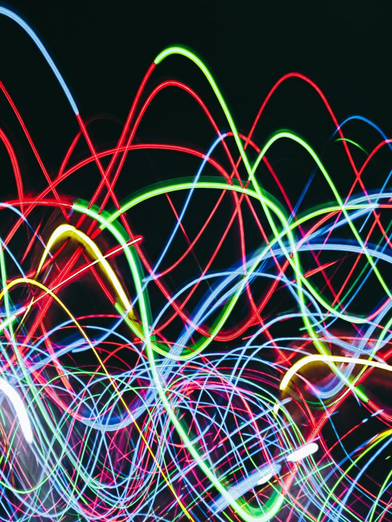 Vibrant Neon Light Lines Wallpaper: Colorful Tangled Background