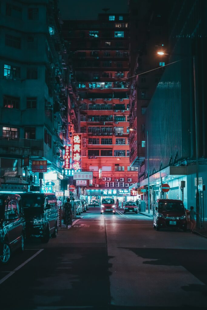Vibrant Neon Urban Street at Night - Cityscape Wallpaper Background