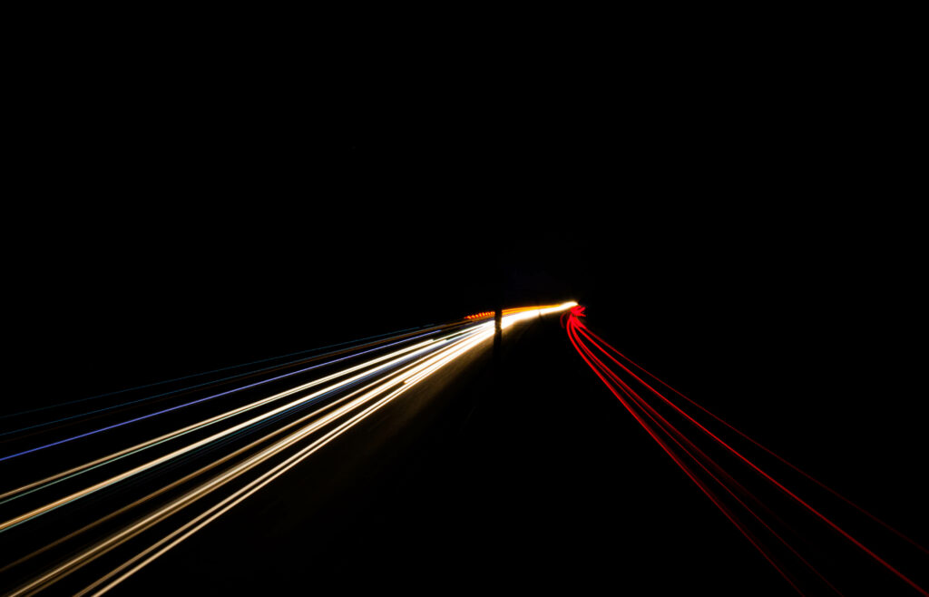 Vibrant Neon Nighttime Road Wallpaper: Futuristic Minimalist Design