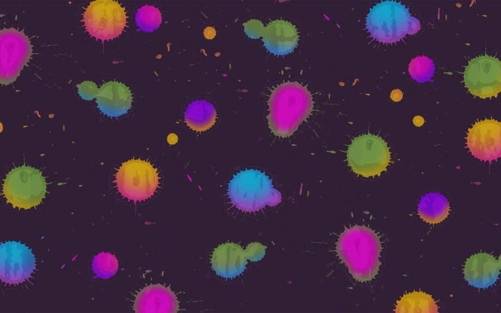 Vibrant abstract paint splatters in neon pink blue yellow lime green on dark purple background wallpaper