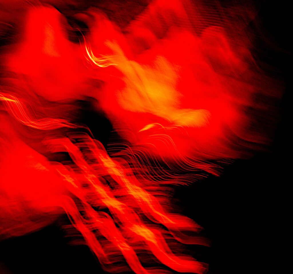 Vibrant Neon Red Waves on Black: Dynamic Abstract Wallpaper