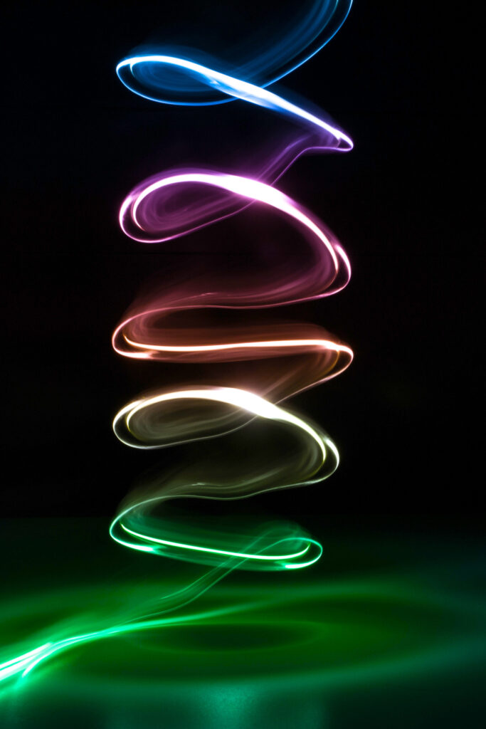 Vibrant Neon Spiral Wallpaper - Mesmerizing Colorful Background