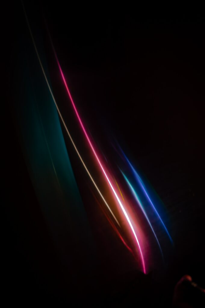 Vibrant Neon Light Streaks: Dynamic Modern Background Wallpaper