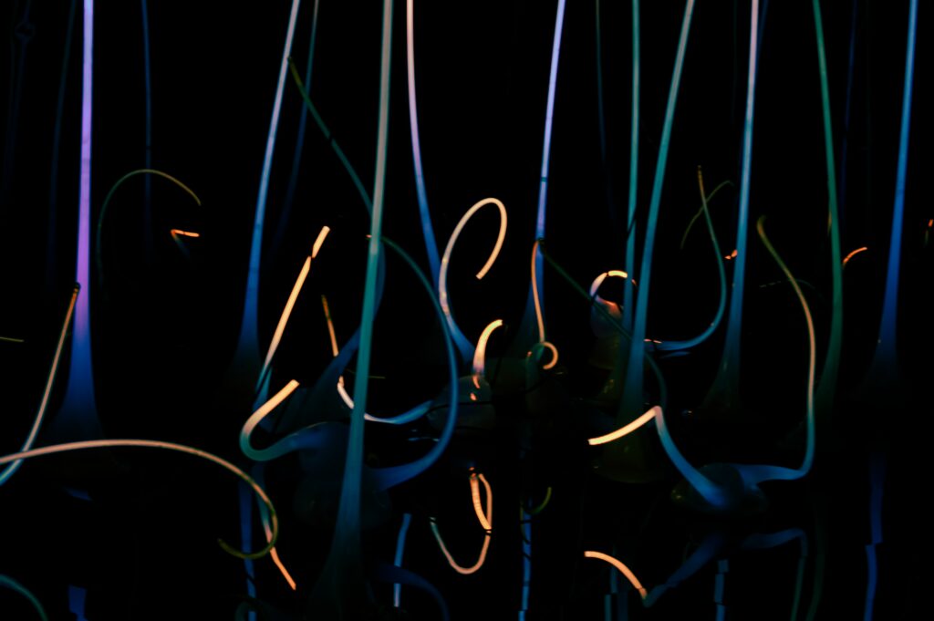 Vibrant Neon Stripes Wallpaper: Abstract Dark Background Design
