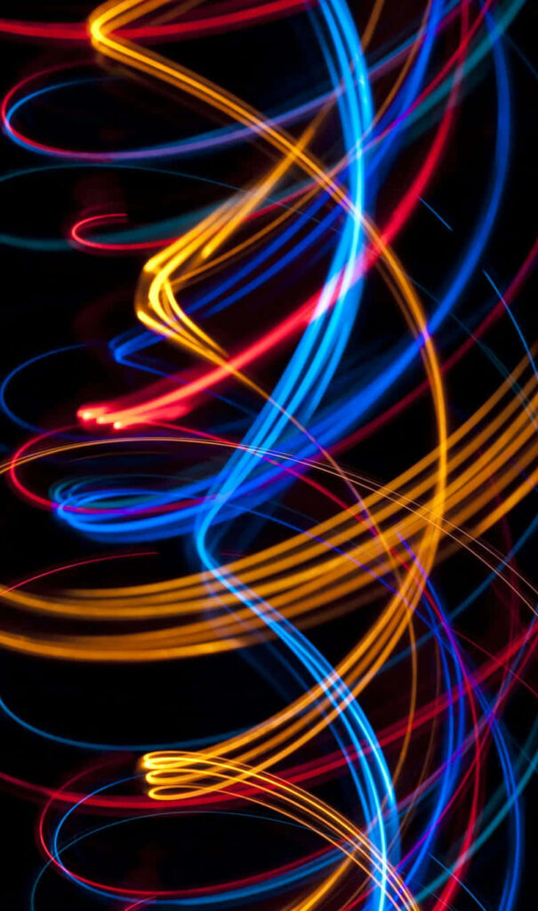 Vibrant Neon Swirls Wallpaper - Dynamic Blue, Yellow, Red Patterns