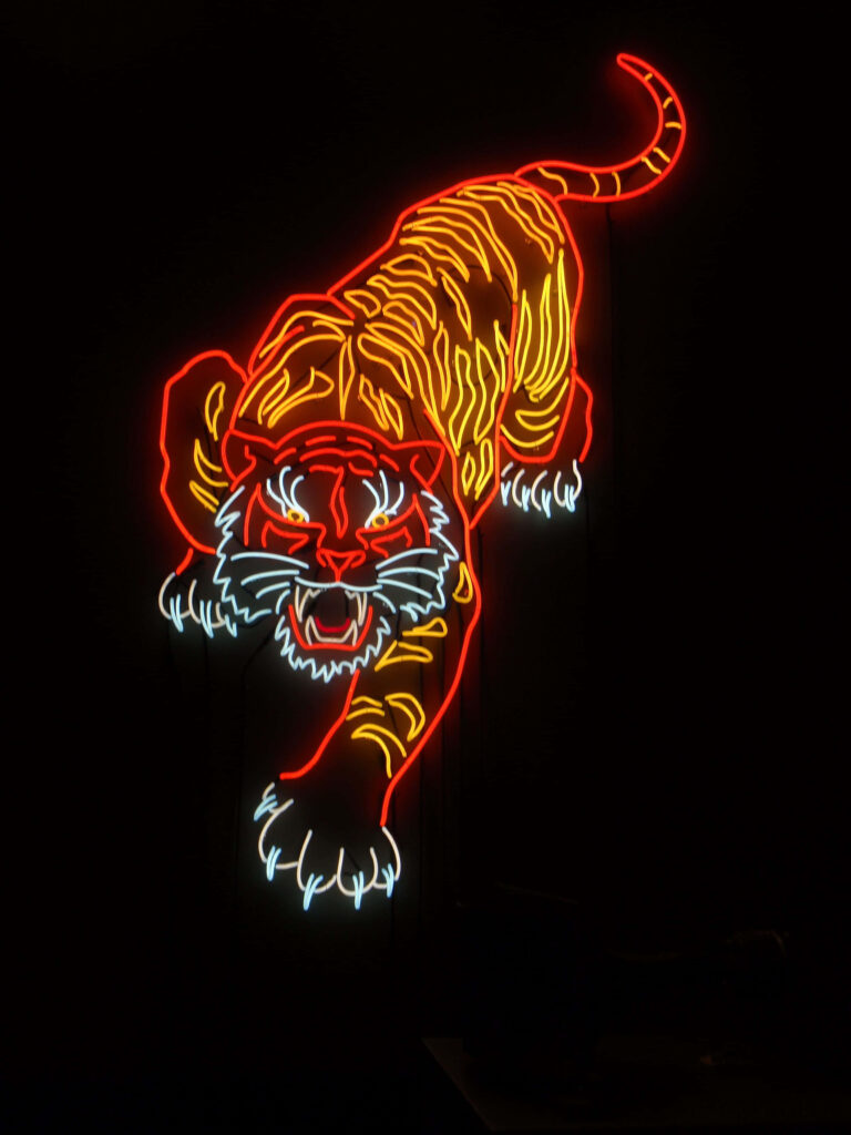 Vibrant Neon Tiger Wallpaper: Bold Red, Yellow & White Design
