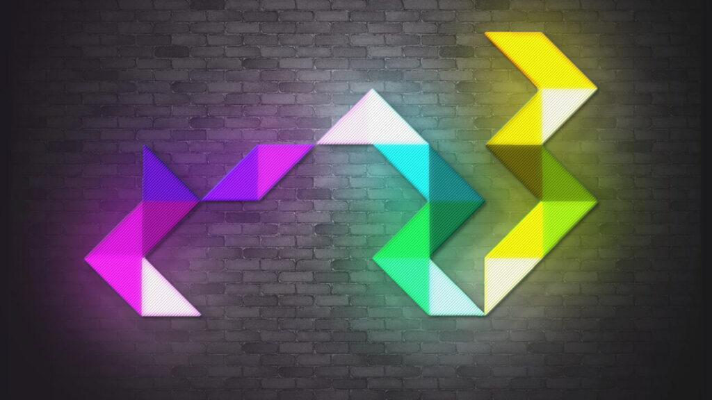 Brilliantly Chromatic Brick Triangle: Abstract Neon LED Sign in Warm Colors Wallpaper