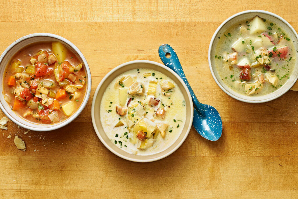 Vibrant New England Clam Chowder Wallpaper with Fresh Herbs & Bowls