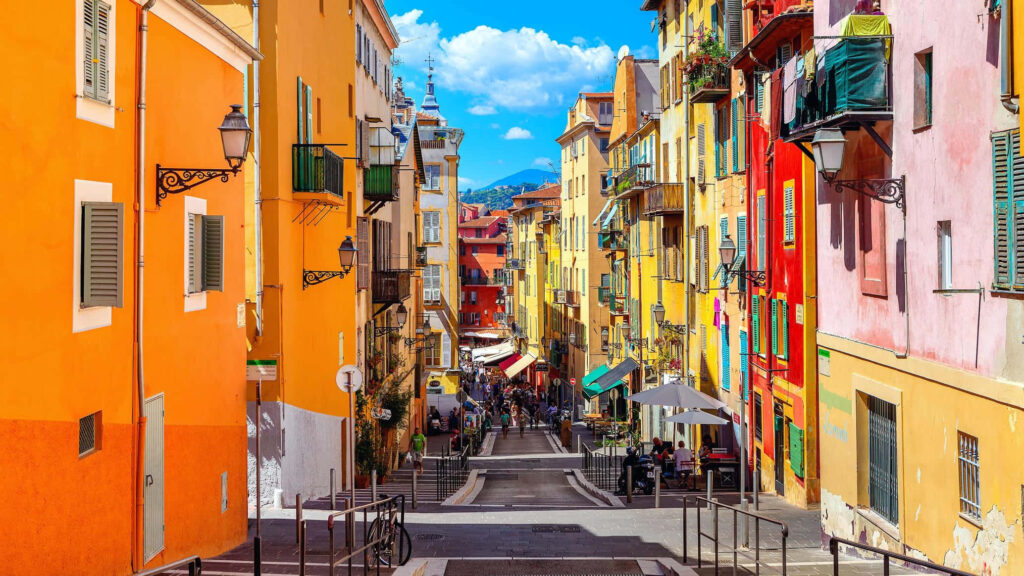 Vibrant Nice, France: Colorful Streets & Charming Architecture Wallpaper